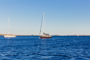 Fototapeta premium Boats over water in Boston Harbor, in Boston, USA