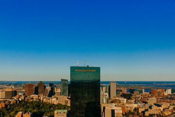 Views of buildings and houses under blue sky at sunset, in Boston, USA