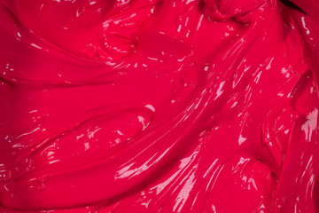 close up plastic pink color of oil paint. ink of screen printing  for print on tee shirts and fabric