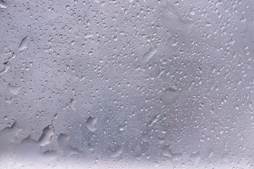 Water droplets on brushed metal surface background