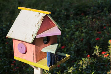 Bird house in a park.
