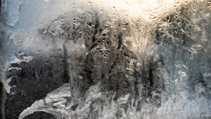 beautifully frozen water on the window from the cold