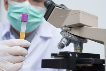 Scientist working in microbiological laboratory