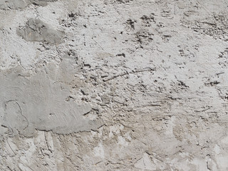 concrete wall splattered with cement.
