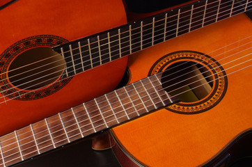 Obraz premium Two acoustic guitars. Close-up