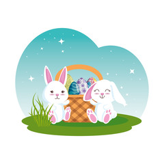 Fototapeta premium cute rabbits couple with easter egg painted in basket