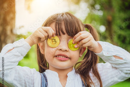 Little Girl Kid Holding Bitcoin Digital Money Concept Of Easy - 