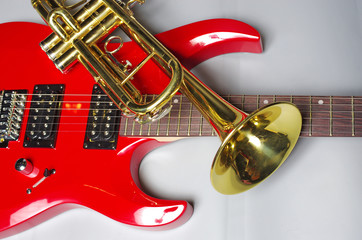 Trumpet and electric guitar. Musical instruments