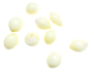 Peeled onions on a white background