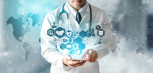 Health Insurance Concept - Doctor in hospital with health insurance related icon graphic interface...