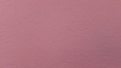 Abstract background of  pink cement wall.