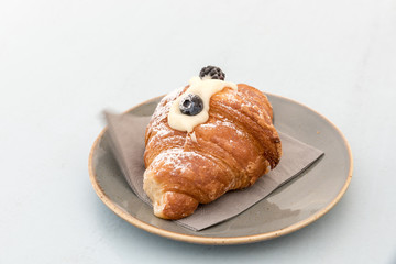 Creamy croissant with berries