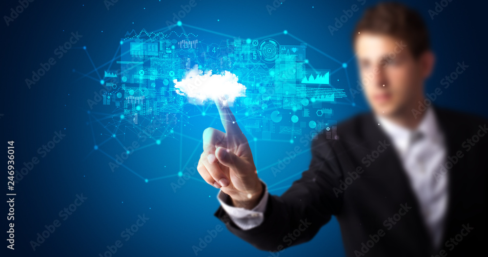 Aufkleber Man touching hologram projection displaying information from cloud based system
