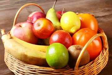 Fresh mixed exotic fruits in basket. Fruits background. Healthy eating, dieting.