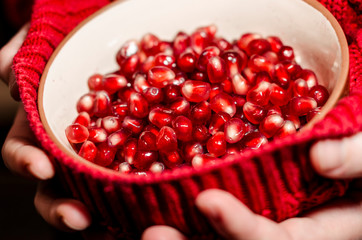 Peeled pomegranate in the bowl