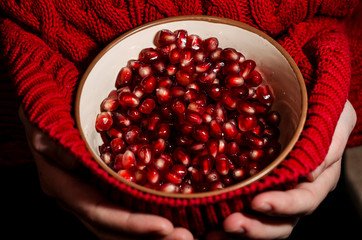 Peeled pomegranate in the bowl