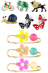 Woman brooches. Collection of brooches shaped like animals or flowers, isolated on white background, clipping paths included