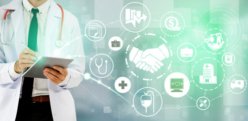 Health Insurance Concept - Doctor in hospital with health insurance related icon graphic interface...