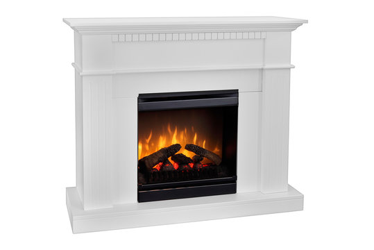 White wooden fireplace with roaring flames, classic elegant design. Isolated on white background, clipping path included. Fireplace as a piece of furniture