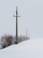 Power lines in the snowstorm in Ebbs, Tirol, Austria