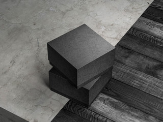 Two Square textured paper black boxes mockup on the concrete floor