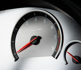 Close up shot of a speedometer in a car