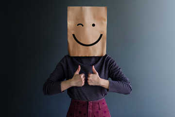 Customer Experience or Human Emotional Concept. Woman Covered her Face by Paper Bag and present...
