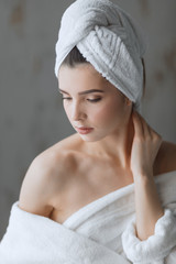 Spa Woman. Attractive woman feeling her skin smooth and well-groomed after bath. Perfect Skin. Skincare. Woman s Beauty, Skin Care