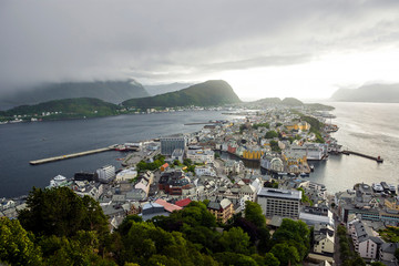 Panoramic view of the archipelago, the beautiful Alesund town centre and the amazing Sunnmore Alps from Fjellstua  Viewpoint, More og Romsdal, Norway