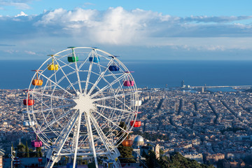 Amusement park with city views