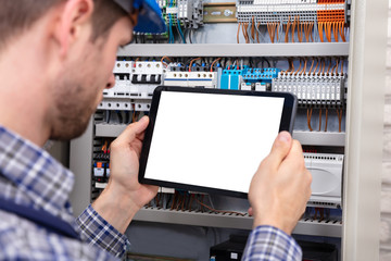 Technician Holding Digital Tablet