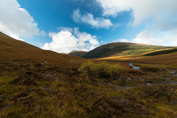 Panorama view of the Fairy Pools on Isle of Skye during a cloud-covered autumn day (Isle of Skye, Scotland, United Kingdom, Europe)