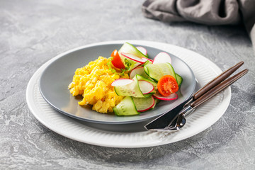 Scrambled  eggs with cucumber and radish