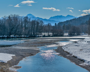 Flowing River with Mountains in the background
