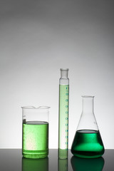 Liquid in laboratory bottles. Scientific biochemical laboratory. Colorful liquid.