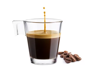 Poster Black coffee in glass cup with coffee beans and  jumping drop on white background © winston