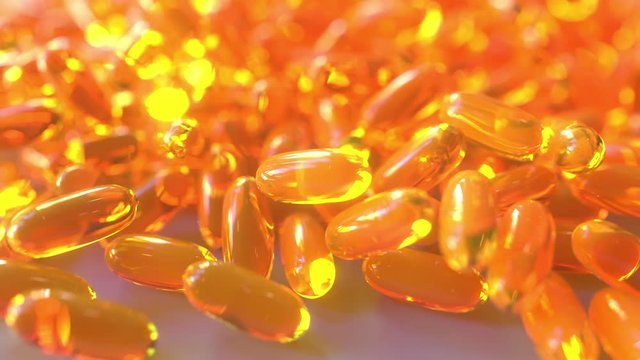 Pouring fish oil or orange drug capsules on the table. Realistic 3D animation