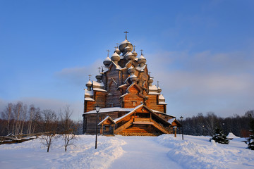 Orthodox wooden old multi domed church monument of architecture in the winter evening  in Russia in the city of St. Petersburg Bogoslovka