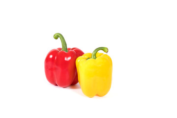 Red, yellow,  fresh and healthy peppers on white background