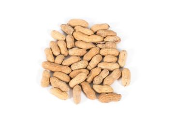 Raw tasty peanuts on white background