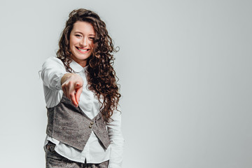 Portrait of attractive business woman on white background. With plenty of copy space. With beautiful curly hair.