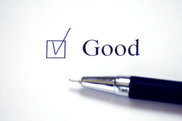Checklist with a word Good on white paper. Checkbox concept.