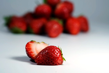 Red strawberry on white background and space for write wording, popular western fruit feed in higher part of Thailand, feel good meaningful fruit for love especially for valentines events