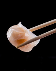 sushi with chopsticks