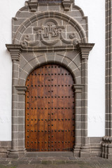Old grunge wooden door of a church