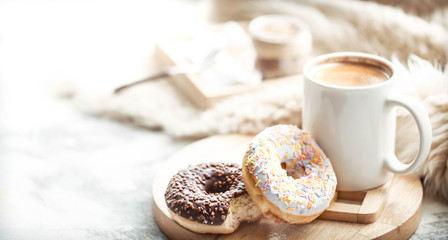 morning breakfast with donuts and coffee at home