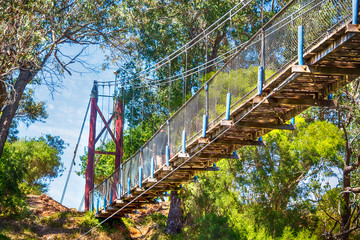 View from under the Suspension Bridge across the Murray River is a popular tourist attraction which ... providing accommodation for army personnel during their stay in Pinjarra. Western Australia 