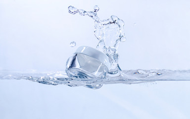 Empty Container Splashing into Water