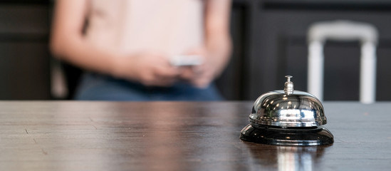 Hotel reception counter desk with service bell.