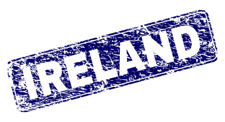 IRELAND stamp seal print with grunge texture. Seal shape is a rounded rectangle with frame. Blue vector rubber print of IRELAND title with grunge texture.